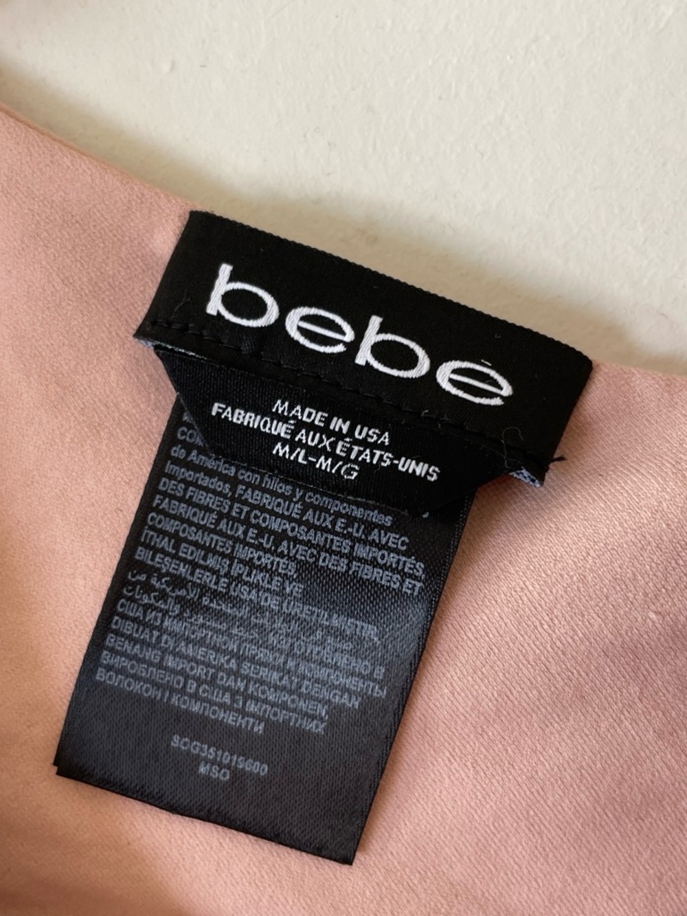 bebe light blush pink top with logo label